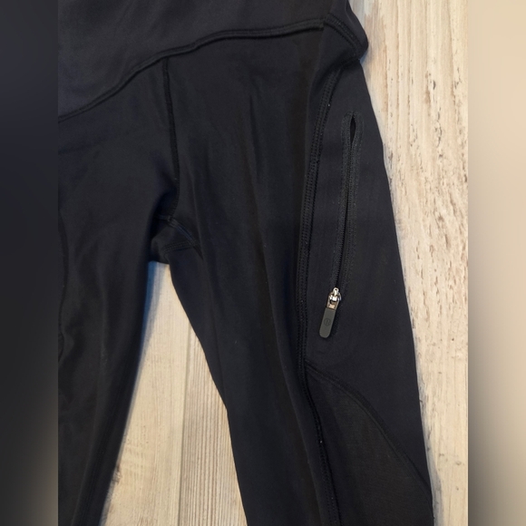 Lululemon Athletica Black Capri Leggings With Zipper Pocket & Mesh Down The Legs - Picture 6 of 10